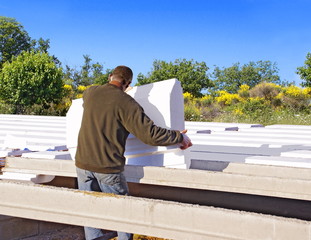 Pose d'un plancher isolant