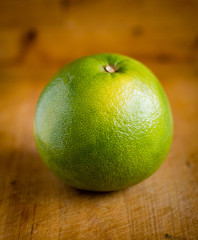 White grapefruit on wooden background