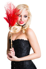 junge blonde Frau mit Stabmaske