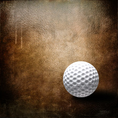 Golf ball over grunge background