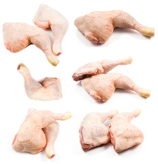 raw chicken legs on a white background