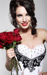 Fragrance. Woman Holding Bouquet of Red Roses. Valentine's Day
