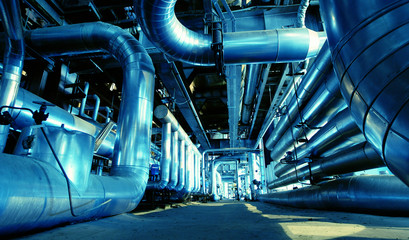 Industrial zone, Steel pipelines and valves in blue tones