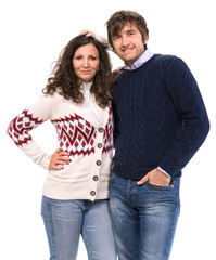 Smiling family  couple in sweaters