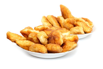Russian patties in the plate on white background