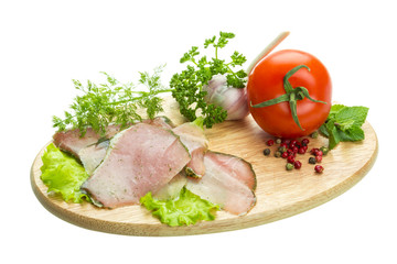 Ripe fresh ham with vegetables