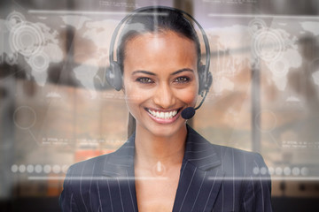 Attractive smiling businesswoman using futuristic interface