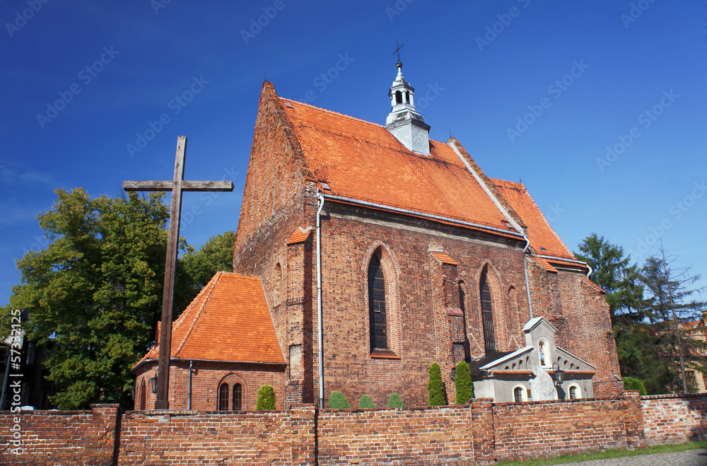 Poster gothic parish church in ostrzeszow, poland.