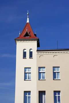 The building with a tower in Ostrzeszow, Poland.