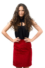 Beautiful brunette woman in red skirt posing fashion in studio