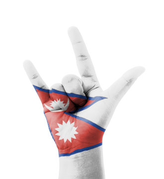 Hand making I love you sign, Nepal flag painted