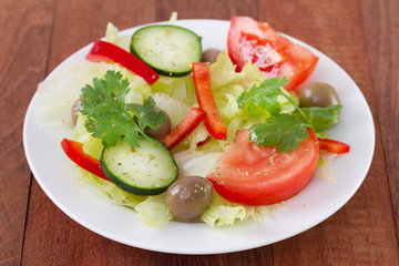 vegetable salad on white plate