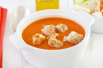 tomato soup in white bowl