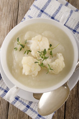 cauliflower soup in a white bowl