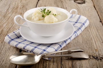 cauliflower soup in a white bowl