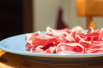 Tipical spanish serrano ham in a plate