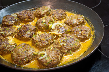 frying meatballs