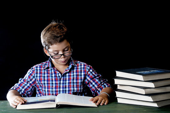 young student reading a book