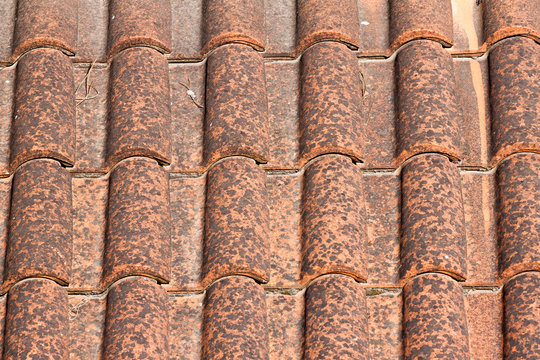 Close up image on very old roof tiles
