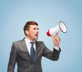 buisnessman with bullhorn or megaphone