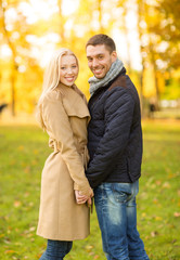 Fototapeta premium romantic couple in the autumn park