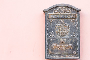 beautiful old mailbox hanging on the wall