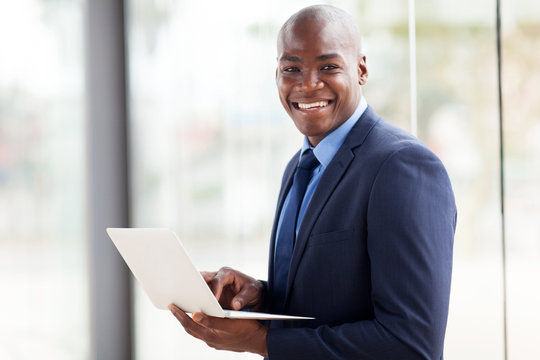 african american businessman with laptop