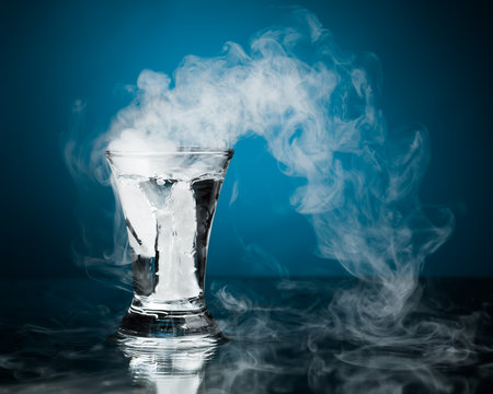 Shot Glass Of Vodka With Ice Vapor