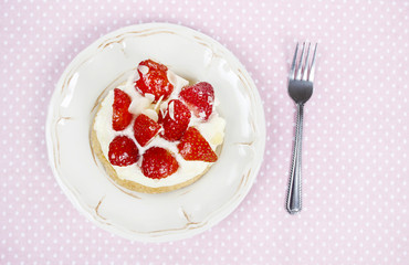 Delicious strawberry cake on party table