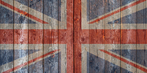 Fototapeta na wymiar The British flag painted on wooden fence