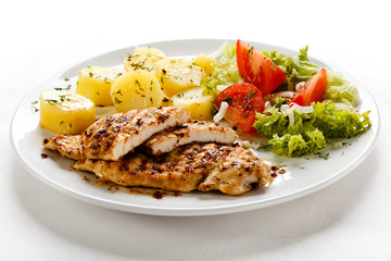 Grilled chicken breast and vegetables