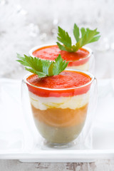 appetizer of mashed colored peppers with goat cheese in a glass