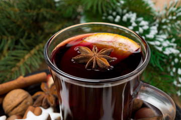 Christmas mulled wine in glass cup close-up