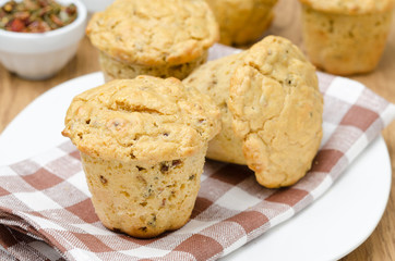 snack muffins with dried peppers and onions on a plate