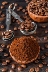 Bowl of coffee beans and ground coffee