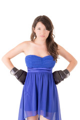 Fototapeta premium Woman in dress and boxing glove on white background,