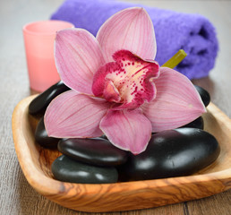 Obraz na płótnie Canvas Massage stones and orchid