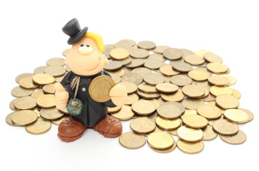 Chimney sweep on a pile of coins. Isolated on white
