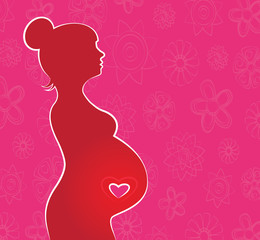 Silhouette of pregnant woman with flower background