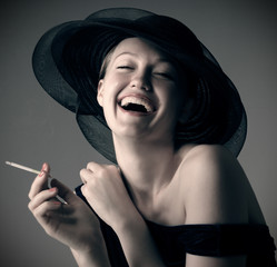beautiful laughing girl in hat