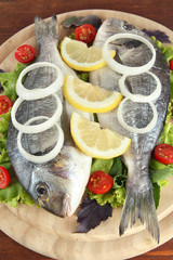 Dorado fish on table close-up
