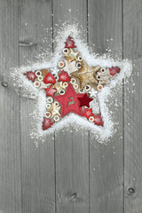 Christmas star on wooden background