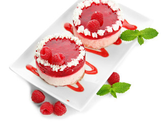 Delicious berry cakes isolated on white