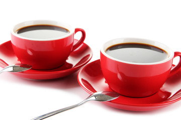 Red cups of strong coffee close up
