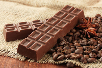 Delicious chocolate bars with coffee beans