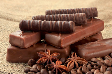 Delicious chocolate bars with coffee beans