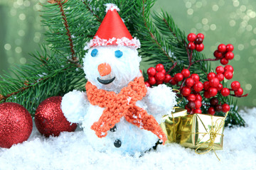 Beautiful snowman and Christmas decor, on bright background