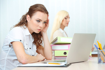 Woman in office at workplace