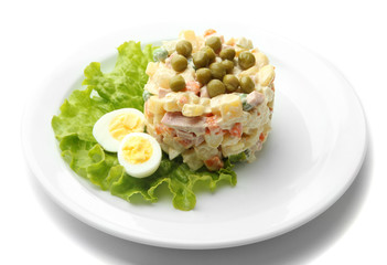 Russian traditional salad Olivier, isolated on white