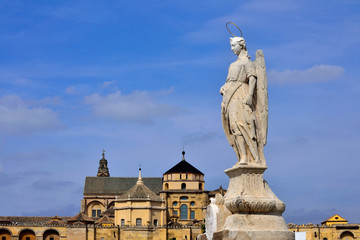 Fototapeta premium St.Raphael Statue with Mosque of Cordoba in background